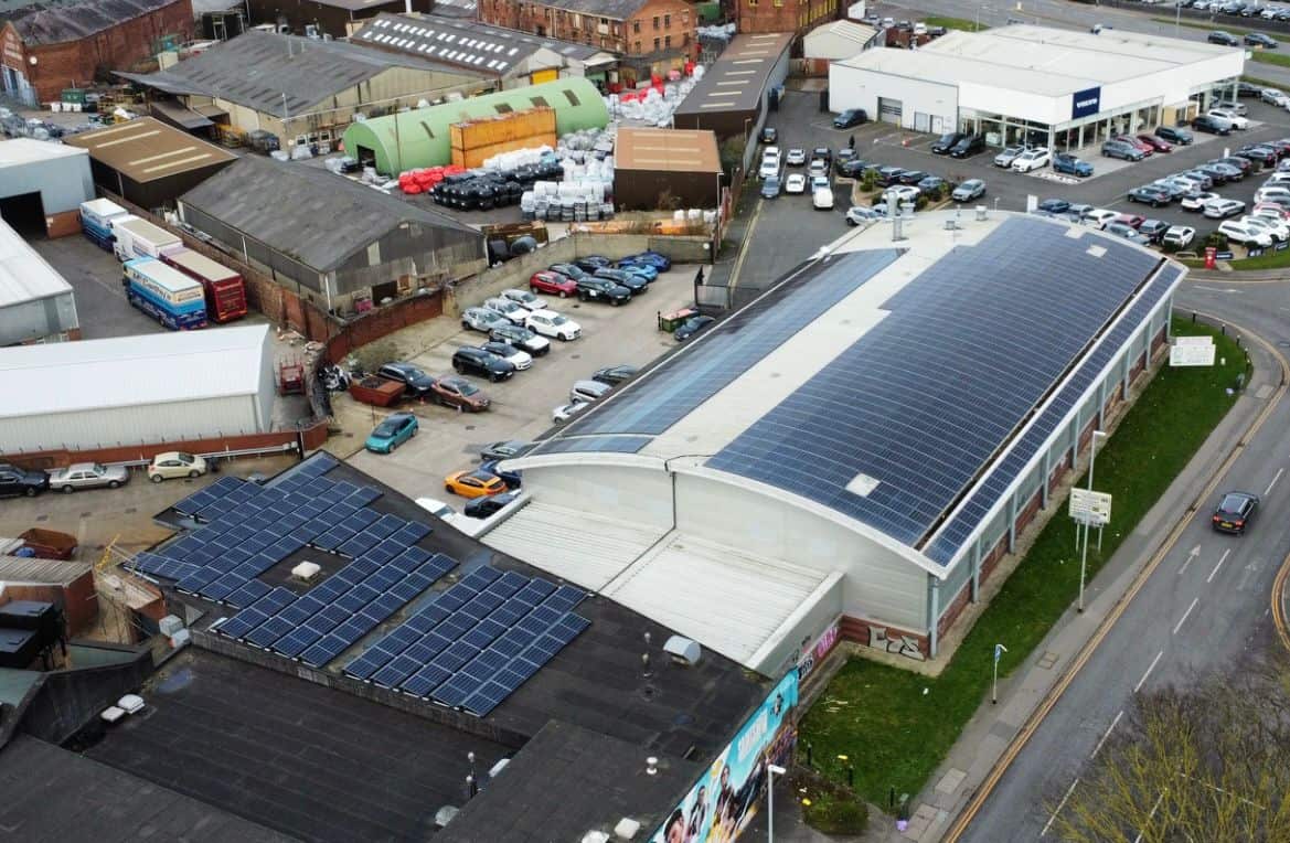 A Building With Solar Panels On The Roof